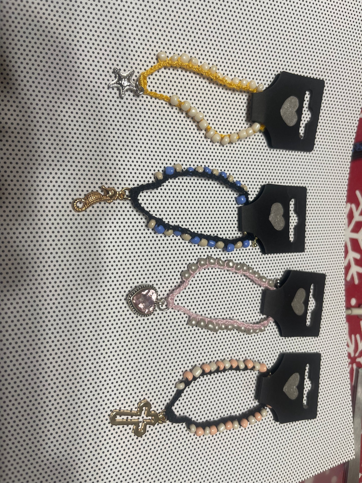 Crochet bracelet with beads and charm